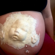 Illustration for article titled This Special Effects Artist Did Something Totally Amazing With Her Pregnant Stomach